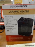 (R5) PROFUSION HEATER; CERAMIC SMALL ROOM HEATER WITH 2 HEAT SETTINGS AND AN ADJUSTABLE THERMOSTAT.