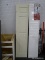 (BWALL) BIFOLDING CLOSET DOOR; CREAM PAINTED, BIFOLDING CLOSET DOOR. HAS A GASH ON THE BOTTOM RIGHT