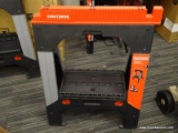 (BWALL) CRAFTSMAN ADJUSTABLE METAL AND PLASTIC SAW HORSE. 2,500 LB. CAPACITY. MEASURES 26.91-IN W X