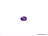 .75 CT OVAL CUT AMETHYST. MEASURES 7MM X 5MM X 4MM.