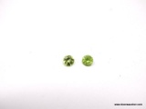 .56 CT ROUND CUT PERIDOT. MATCHED PAIR. MEASURES 4MM.