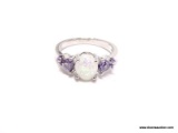 .925 STERLING SILVER LADIES 1-1/2 CT OPAL AND AMETHYST RING. SIZE 7.5.
