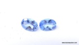 1.40 CT OVAL CUT BLUE TOPAZ MATCHED PAIR. MEASURES 7MM X 5MM X 3MM.