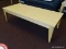 (FOY) MCM STYLE NATURAL WOOD GRAIN COFFEE TABLE WITH RECTANGULAR TOP AND TAPERED LEGS. MEASURES 54