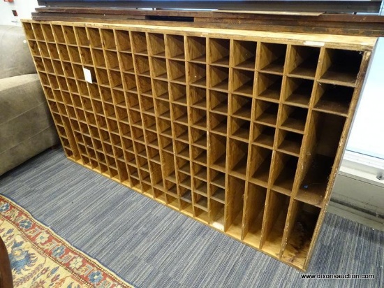 (R1) VINTAGE POST OFFICE MAIL SORTER; OAK MAIL SORTER WITH 180 POTENTIAL SLOTS. MEASURES 76.5" X 16"