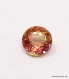 2.61 CT ROUND CUT MYSTIC TOPAZ. MEASURES 8MM X 5MM.