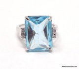 .925 STERLING SILVER LADIES 5 CT BLUE TOPAZ RING. SIZE 7 1/2.