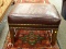 (LEFT WALL) OTTOMAN; MAHOGANY FAUX LEATHER AND BRASS STUDDED OTTOMAN- 22 IN X 19 IN X 16 IN