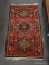 (LEFT WALL) SEMI-ANTIQUE ORIENTAL RUG; SEMI-ANTIQUE HAND WOVEN HAMADAN ORIENTAL RUG IN RED, BLUE,