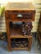 (LEFT WALL) ANTIQUE ORIENTAL STAND; ONE OF A PR. OF ANTIQUE ORIENTAL MAHOGANY AND PINE 1 DRAWER