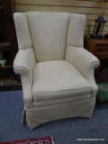 (LEFT WALL) WING CHAIR; MAHOGANY QUEEN ANNE WING CHAIR WITH BEIGE UPHOLSTERY- 32 IN X 39 IN X 39 IN