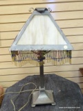 (LEFT WALL) ANTIQUE LAMP; ANTIQUE MISSION DESIGNED SLAG GLASS LAMP WITH BEADED TASSELS- GLASS IN