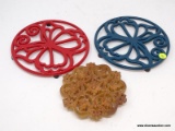 (LEFT WALL) TRIVET LOT; 3 TRIVETS- 2 METAL TRIVETS- 8 IN DIA. AND 1 TEAKWOOD- 6 IN