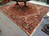 (R1) ORIENTAL RUG; SEMI- ANTIQUE ORIENTAL HAND WOVEN HAMADAN RUG IN RED, BLACK AND BROWN- SHOWS WEAR