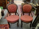 (R1) PR. VICTORIAN CHAIRS; PR. OF VICTORIAN SIDE CHAIRS WITH CARVED CREST AND MAROON UPHOLSTERY- 18