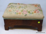 (R1) EMPIRE FOOTSTOOL; ANTIQUE MAHOGANY EMPIRE FOOTSTOOL WITH CREWEL WORK UPHOLSTERY- 16 IN X 12 IN