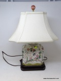 (R1) ORIENTAL LAMP; PAINTED DECORATED PORCELAIN ORIENTAL LAMP ON ROSEWOOD BASE WITH CLOTH SHADE- 22