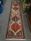 (R1) ORIENTAL RUNNER; HANDWOVEN PERSIAN RUNNER WITH BIRD AND FLOWER DESIGNS IN IVORY, BLUE AND RED-