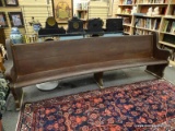 (R2) CHURCH PEW; 9 FT. SOLID OAK CURVED CHURCH PEW WITH HYMNAL HOLDER- 9 FT. X 24 IN X 38 IN H