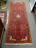 (LEFT WALL) ORIENTAL RUNNER; HAND WOVEN ORIENTAL HAMADAN RUG IN RED, BROWN AND IVORY- 28 IN X 82 IN