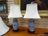 (LEFT WALL) PR. OF ORIENTAL LAMPS; PR. OF BLUE AND WHITE PORCELAIN ORIENTAL LAMP ON ROSEWOOD BASES