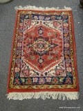 (LEFT WALL) SEMI ANTIQUE ORIENTAL RUG; SEMI ANTIQUE ORIENTAL HAMADAN RUG IN RED, IVORY AND BLUE-
