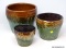 (RIGHT WALL) VINTAGE SET OF PLANTERS; VINTAGE GRADUATED SET OF GLAZED UNMARKED POTTERY PLANTERS-