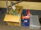 (RIGHT WALL) MISC. LOT; LOT INCLUDES HONEYWELL FAN IN BOX, BOX OF CLOTHES HANGERS, MESH WIRE DESK