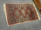 (R2) SEMI- ANTIQUE ORIENTAL RUG; HANDWOVEN SEMI- ANTIQUE BOKHARA ORIENTAL RUG IN MAROON, BROWN AND