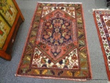 (R2) ORIENTAL RUG; HAND WOVEN PERSIAN TREE OF LIFE PATTERNED RUG IN MAUVE, BLUE AND IVORY, MISSING