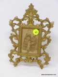 (R2) BRASS FRAME; ANTIQUE VICTORIAN BRASS FRAME WITH ANTIQUE CART DE VISTA OF VICTORIAN COUPLE- 5 IN