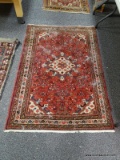(R2) ORIENTAL RUG; HAND WOVEN HAMADAN ORIENTAL RUG IN RED BROWN AND IVORY WITH FLORAL PATTERNS- 41