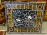 (R2) FRAMED STAINED GLASS; ANTIQUE FRAMED STAINED GLASS WINDOW WITH FLOWERS- DAMAGE TO ONE PANEL ON