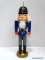 (R4) ERZGEBIRGE WARRIOR NUTCRACKER HOLDING AN AXE IN HIS LEFT HAND - BLUE WITH GRAY PANTS. MEASURES