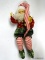 (BR) MARK ROBERTS FAIRY; MEDIUM MARK ROBERTS FAIRY HOLDING 2 PRESENTS AND WEARING RED AND WHITE