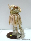 (BWALL) PORCELAIN JESTER DOLL HEAD ON A STAND; PINK COLORED, PORCELAIN JESTER DOLL WITH A ROUND