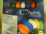 (R4) PAIR OF CERAMIC, MULTI-COLORED, C-7 STRING LIGHTS WITH 25 LIGHTS ON EACH SET. MEASURES 25 FT