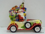 (R2) LARGE CHRISTOPHER RADKO ORNAMENT OF SANTA DRIVING A VINTAGE CONVERTIBLE WITH THE SEATS