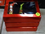 (R1) 8 PIECE SET OF MATCHING STOCKING ORNAMENTS WITH A GREEN, RED, AND WHITE COLOR. COMES IN 3