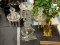 (TABLES) CRYSTAL CANDELABRA; 3-ARM, ORNATE, CRYSTAL CANDELABRA WITH DANGLING FACETED GLASS PENDANTS.
