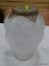 (TABLES) FROSTED GLASS ROSE VASE WITH AN ORNATE BRASS LAYERED RIM. MEASURES 9.75