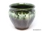 (RFRT) FLORAL PLANTER; BROWN, LIGHT GREEN, AND GREEN PLANTER WITH FLORAL AND LEAF PATTERNING.