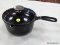 (RFRT) TIM LOVE COOKWARE, ENAMEL CAST IRON, BLACK SAUCE POT WITH LID AND HANDLE. MEASURES 4.25