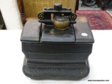 (TABLES) MCCOY POTTERY, VINTAGE BLACK STOVE COOKIE JAR. MADE TO LOOK LIKE A WOOD BURNING STOVE WITH
