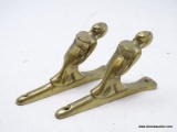 (RFRT) PAIR OF BRASS WOMAN FIGURINE CURTAIN HOOKS. LOOKS LIKE THE WOMAN FIGURINES AT THE FRONT OF A
