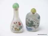 (RFRT) PAIR OF CHINESE GLASS SNUFF BOTTLES; 2 PIECE LOT TO INCLUDE A FLORAL AND LANDSCAPED SCENE