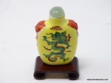 (RFRT) CHINESE, YELLO PORCELAIN SNUFF BOTTLE WITH FOO DOGS ON THE SHOULDERS AND A GREEN DRAGON