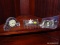 (DR) MISCELL. LOT; LOT INCLUDES 4 SILVERPLATE NAPKIN RINGS, CRYSTAL CLOCK- 4 IN H, GLASS BOX WITH