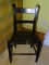 (BDRM2) MULE EAR SIDE CHAIR; BLACK PAINTED, LADDERBACK SIDE CHAIR WITH A WOVEN SEAT. MEASURES 18.5