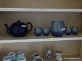 (KITCHEN) SHELF LOT OF GLASS DISHES AND TEA POT; 6 PIECE LOT TO INCLUDE A DEEP BLUE GLAZED POTTERY